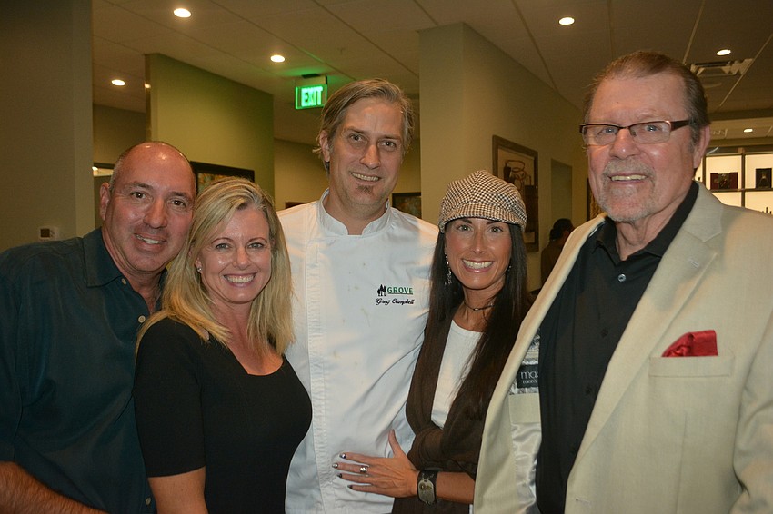 Craig and Cynthia Belfatto, Grove General Manager Greg Campbell and his wife, Colleen, and Joe O'Rourke talk about the opening of Lakewood Ranch's newest restaurant.