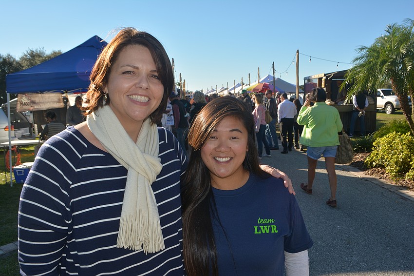 Monaca Onstad, the director of community relations for Lakewood Ranch Communities, and The Market Manager Morgan Bettes, were pleased with a big crowd on opening day for The Market.