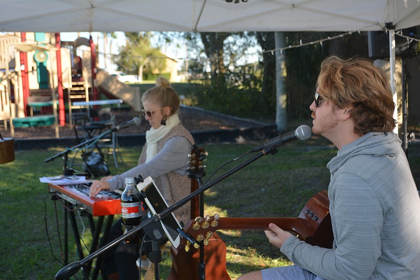 Brandi Adams and Trevor Bystrom entertain the crowd at the season opener.
