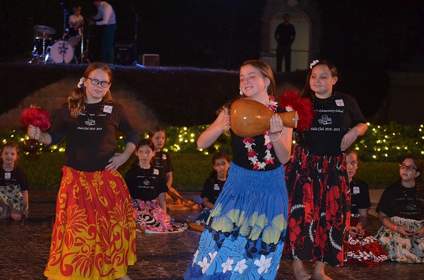 Southside Elementary's Hula Club, performed a traditional hula dance, shown here by Norah Darmuth, Alohi Glover and Rubie Cervantes.