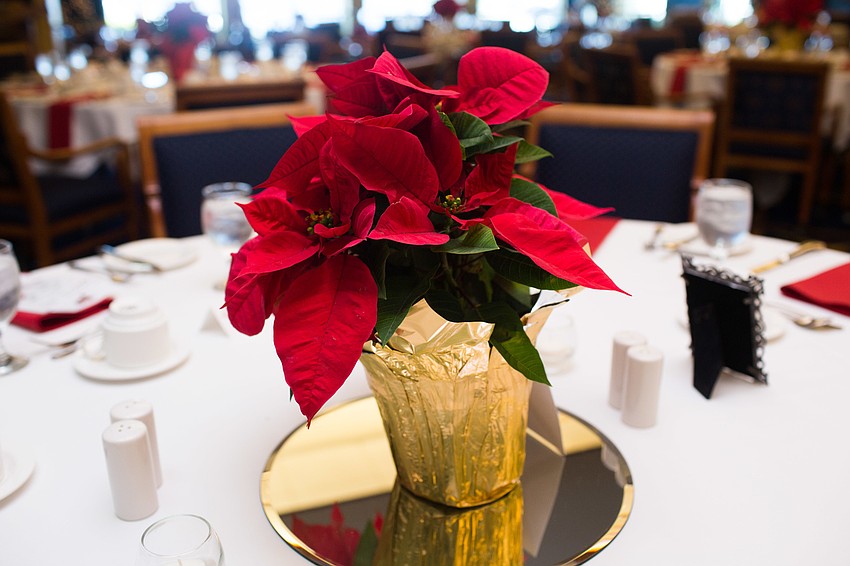 Poinsettias (appropriately) adorned the tables.