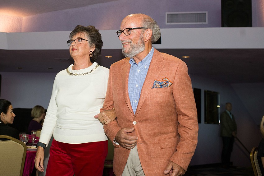 Ellen Harnden and Steve Oppen walk the runway.