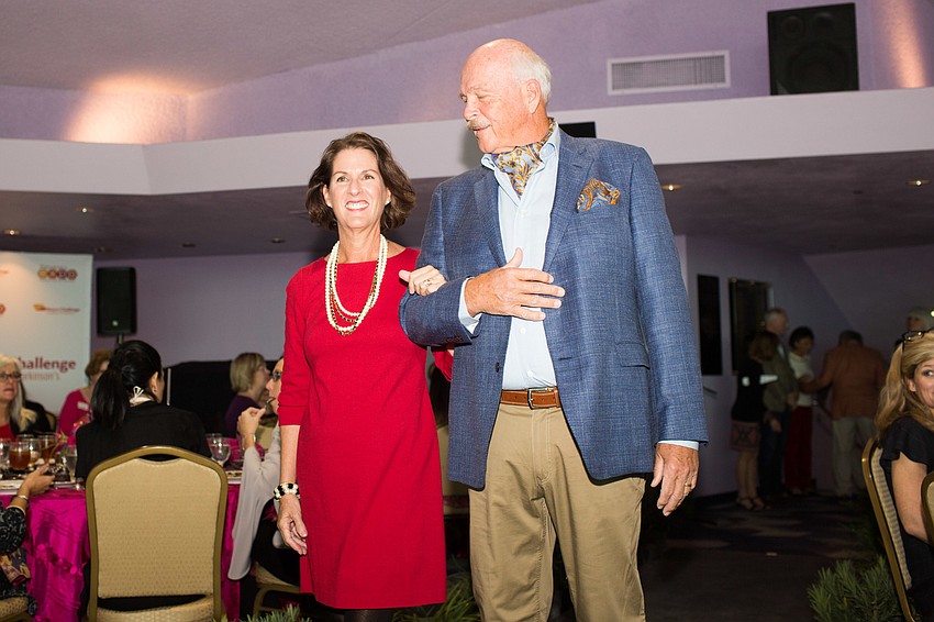 Carolina and Mark Murphy walk the runway.