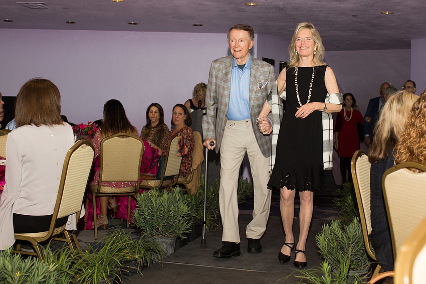Jack and Linda Sloan walk the runway.