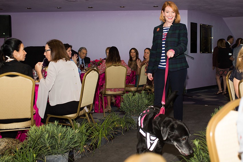 Emily Walsh and Bella walk the runway.