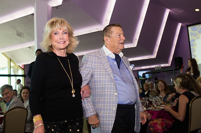 Billie and Greg Erwin walk the runway.