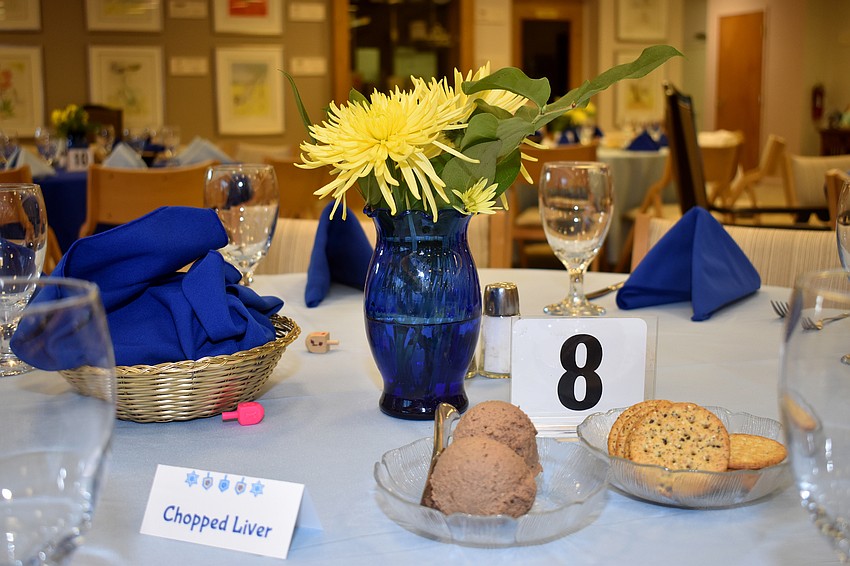 More than 100 temple members gathered for a concert and dinner before the candle lighting.