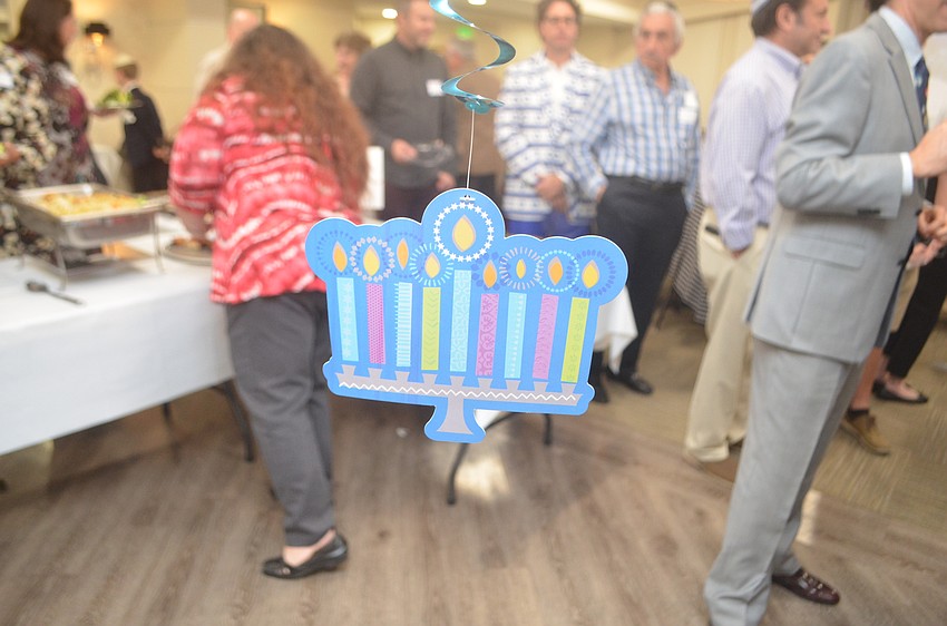 The Hanukkah Happening dinner is a temple-wide, multigenerational event.