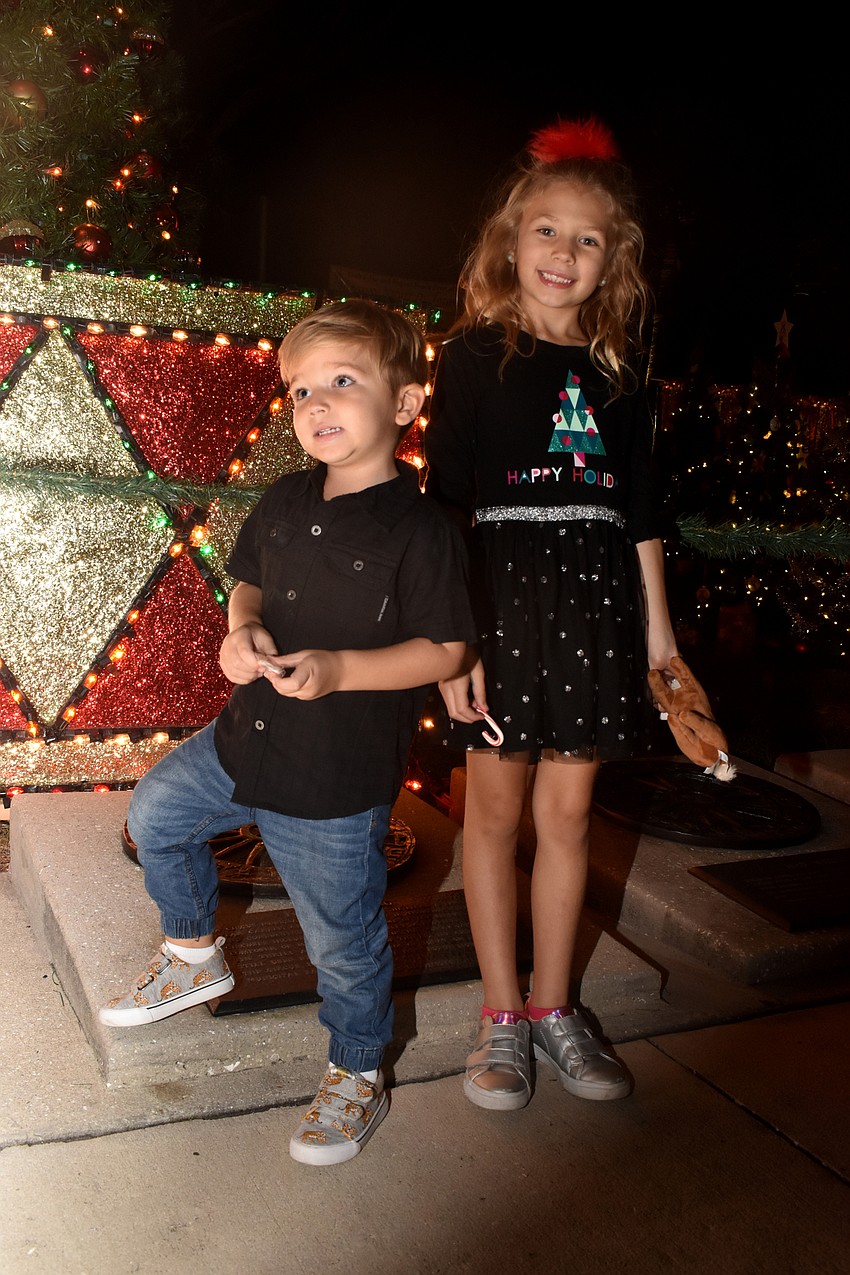 Kaleb and Kenzie Kroening visit with Santa.