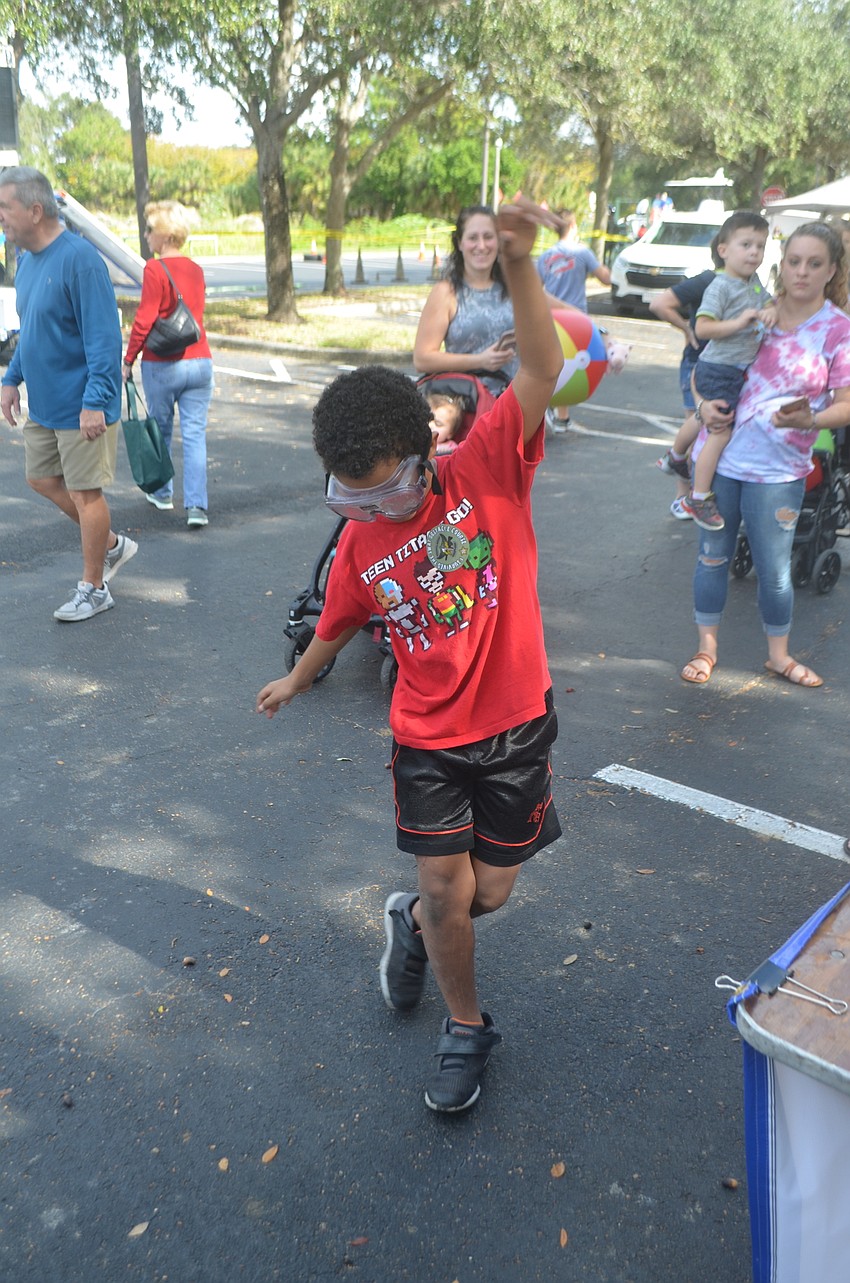 Steven Jacquez can't quite figure out how to walk when he tries on drunk goggles.