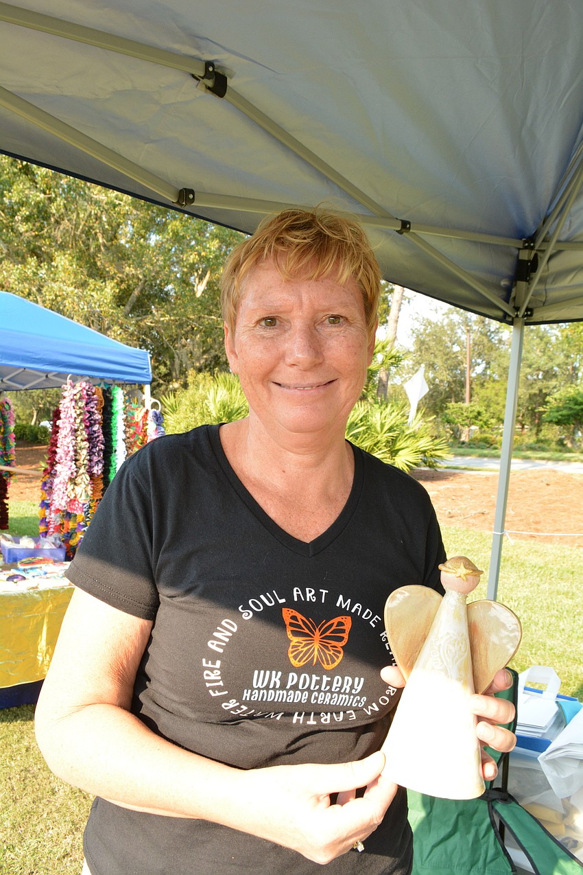 Mill Creek resident Wilma Kroese makes clay angels and angel ornaments for the holidays. Normally, she sells traditional pottery.