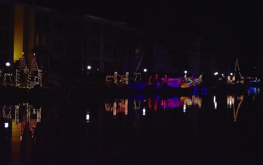Residents decorated their docks with lights and lit them together on Dec. 8.