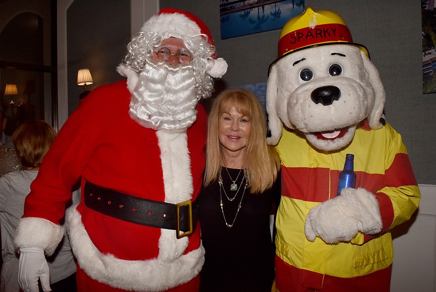Gaily Gilvey with Santa Claus and Sparky