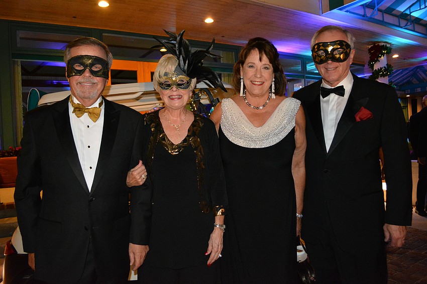 Terry Defibaugh, Terry Kees and Janet and Tom Turek arrive early.