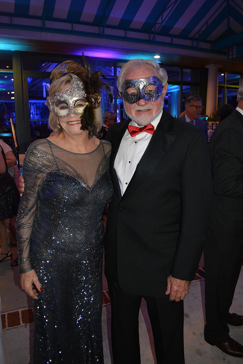 University Park Women's Club President Beth Bertsch, with her husband Gary, said she loves this year's party theme. 