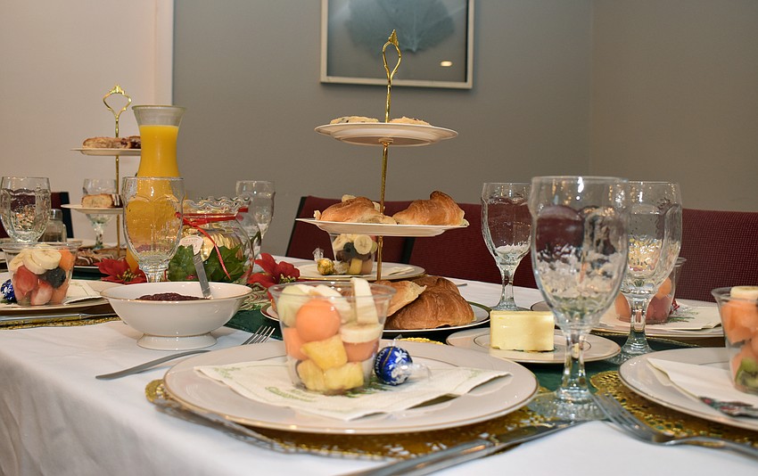 Croissants, fruit and chocolates awaited guests at their tables.