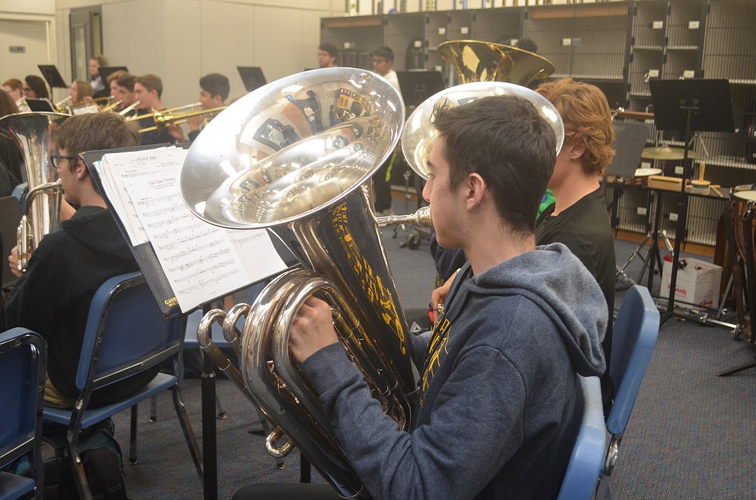 Michael Gutierrez on tuba will be one of the band members to debut the piece.