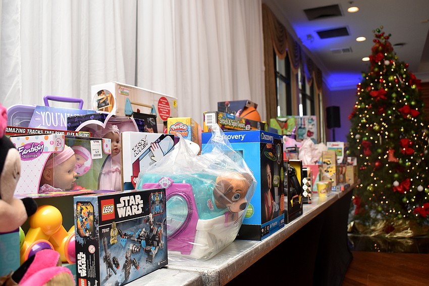 Each golfer was asked to bring a gift to be donated to Toys for Tots.