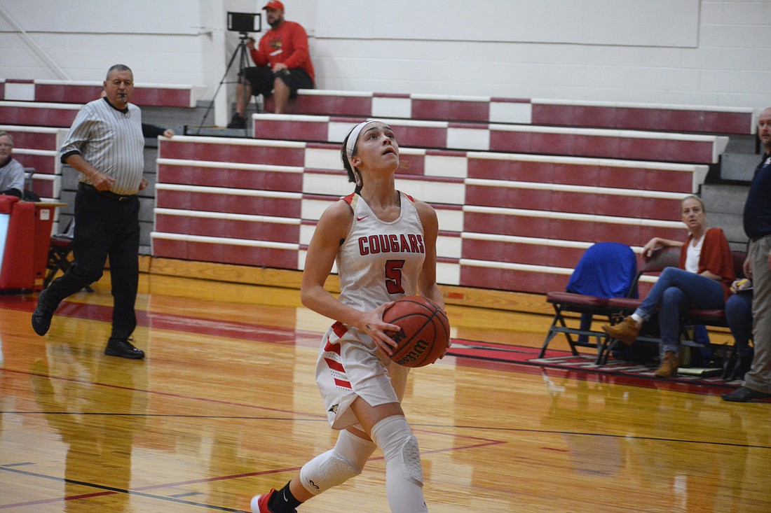 Cardinal Mooney guard Madison Smithers lines up a layup against Sarasota Christian. She led the team with 13 points.