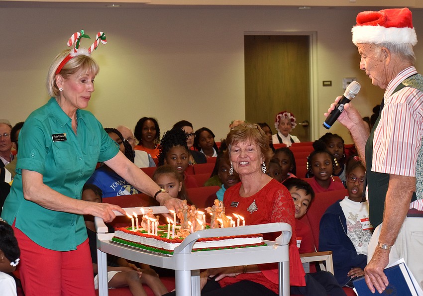 Christ Church members roll out a birthday cake for Jesus.