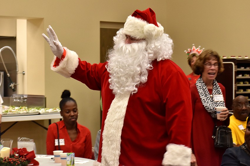 Santa Claus made a special appearance to give gifts to all the students.