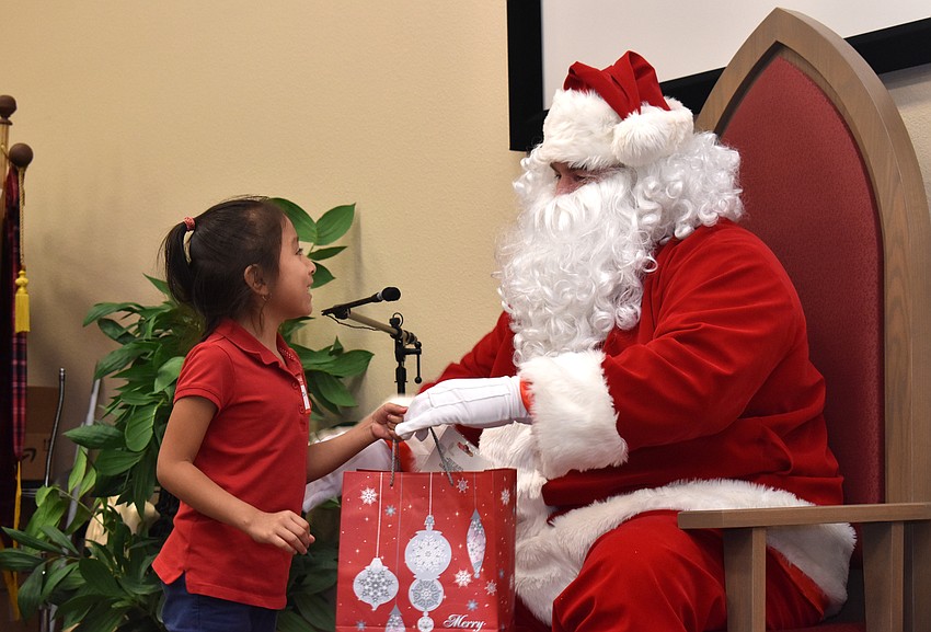 Yulissa Hernandez chats with Santa.