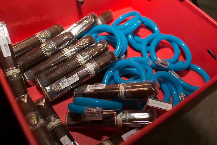 Guests could both purchase cigars bracelets to support CPC's mission.