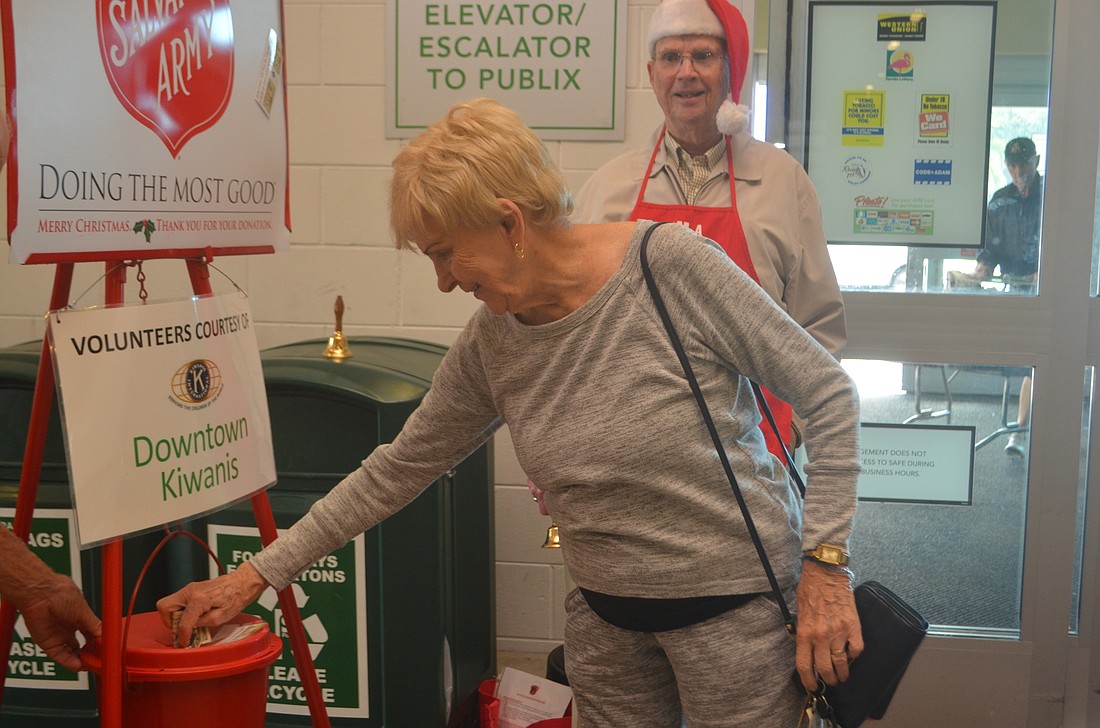Peggy O&#39;Donnell makes a donation at the Publix on Bay Street.