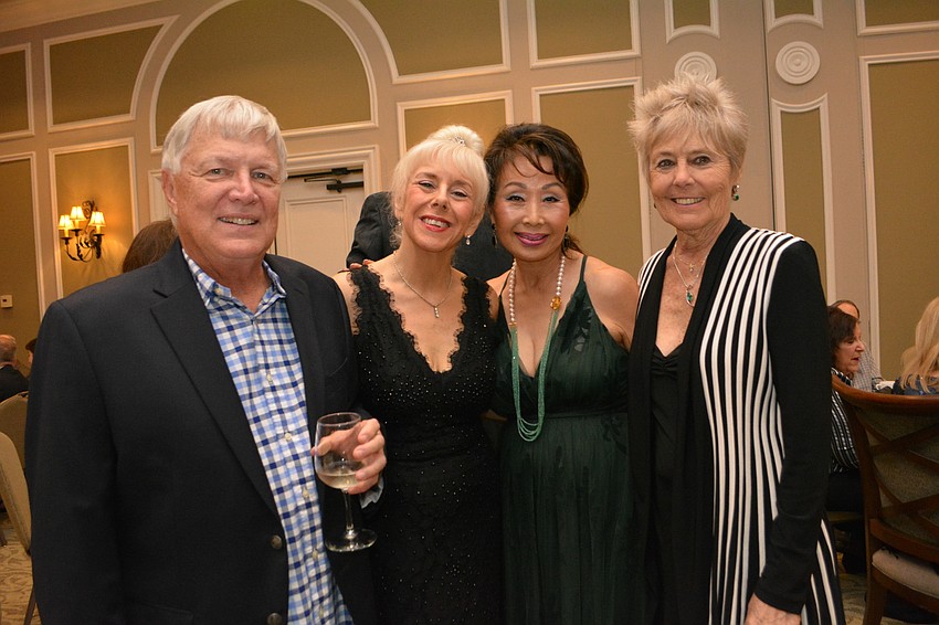 Jim and Monika Templeman catch up with Linda Patzmann and Darlene Stewart.