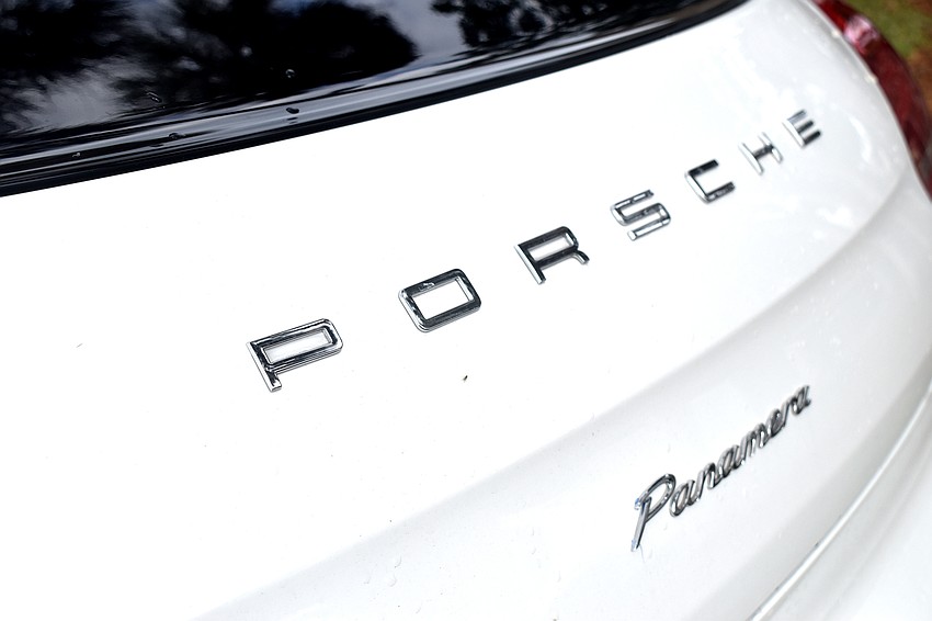 Despite the gloomy weather, plenty of people still circled St. Armands to admire the cars.