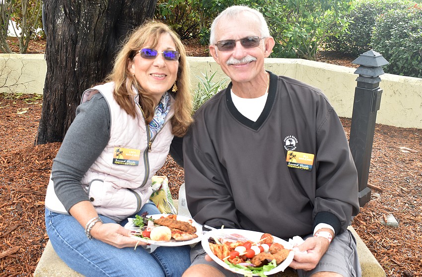 New and older models of Porsches lined St. Armands Circle.