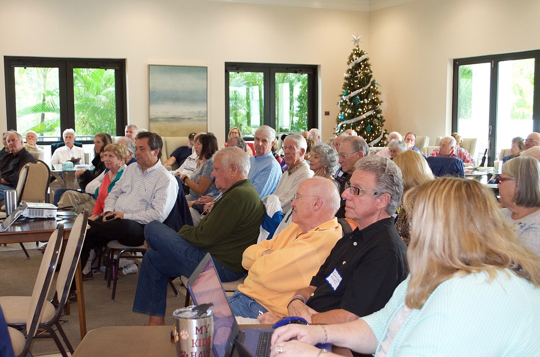 Members of Federation of Longboat Key Condominiums learn about red tide.