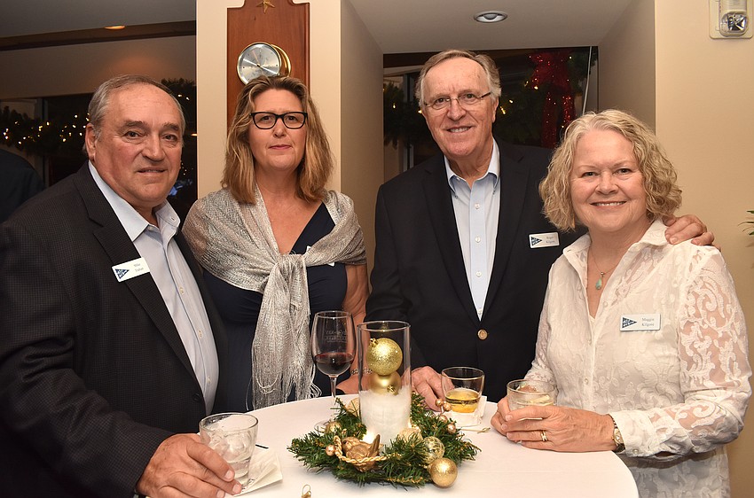 Mike and Des Trahan and Roger and Maggie Kilgore