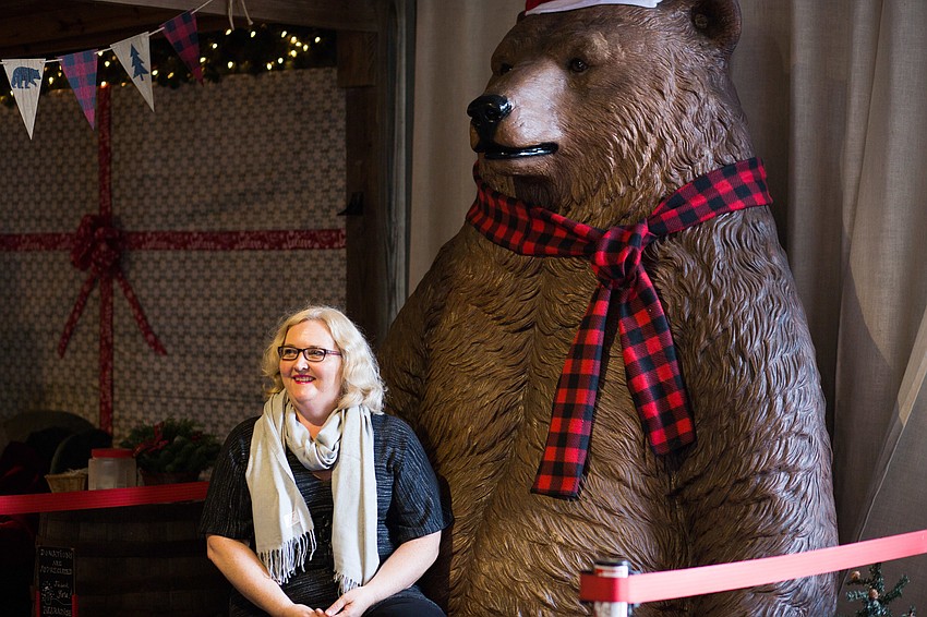 Cherylann Haley poses for a photo with the bear.