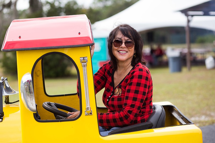 CEO and President Monica Welde smiles as she gives tractor rides.