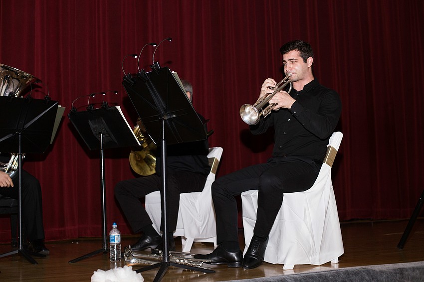 Music played throughout cocktail hour.