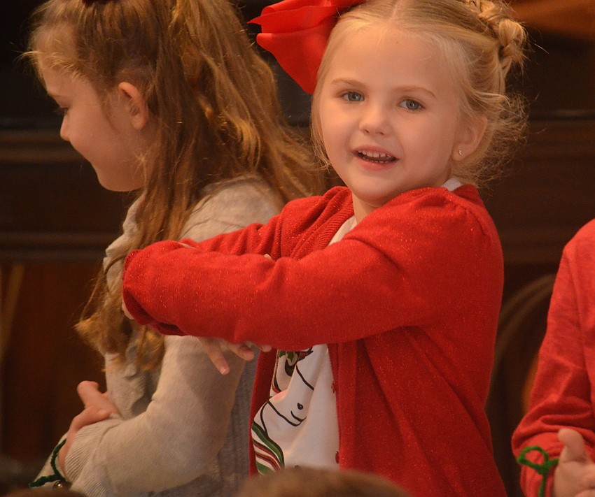 Asa Alfano dances along to the song.