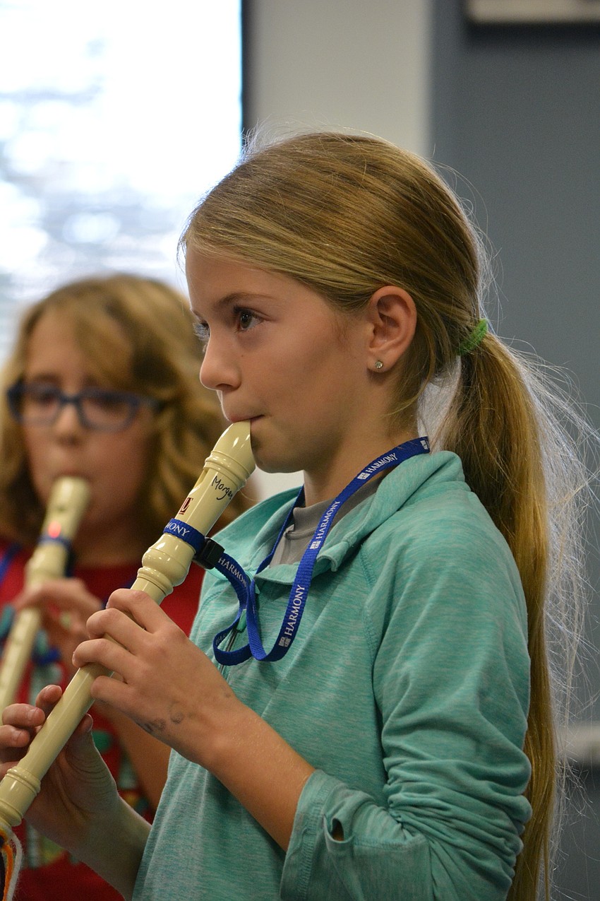 Fourth-grader Morgan Amato showcases her skills on the recorder.