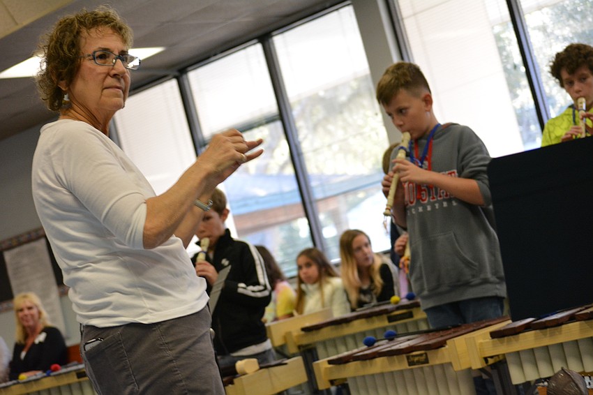 Music teacher Marsha Perry Juday leads the Orffestra.