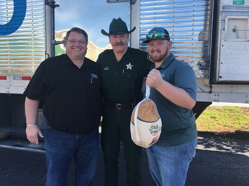 Chris Quattlebaum, Deputy Bruce Meade and Zach Quattlebaum