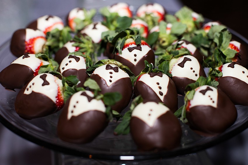 Guests enjoyed appetizers and desserts while they waited for the lights to turn on.