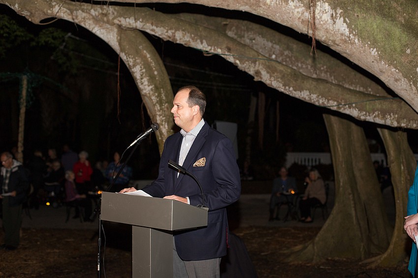 Mike Wilson welcomes the 190 guests to Lights in Bloom.