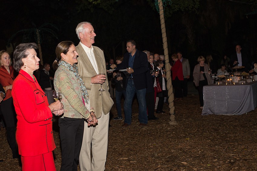 Circle Members and other special guests gathered around to see the first lighting.