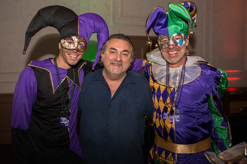 Co-Chairman Ryan Inskeep, Phil Mancini and Co-Chairman Brent Greeno at the Goodwill Mardi Gras Gala Feb. 8 at Michael's On East.