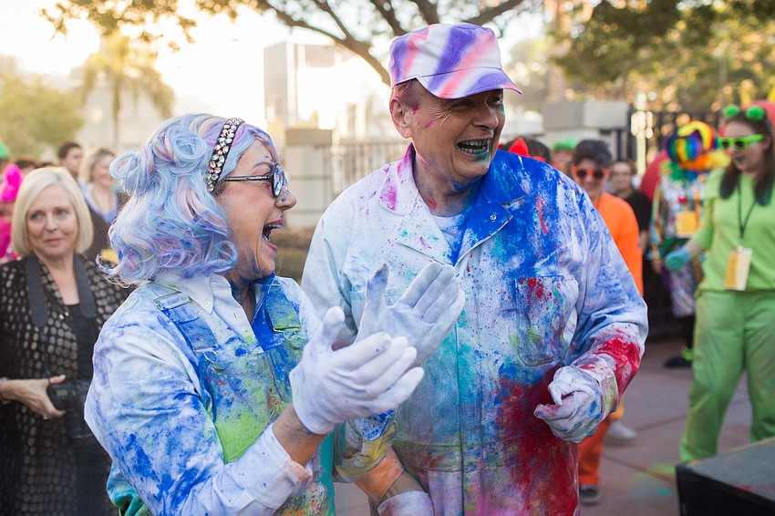 Pat Thompson and Ringling College President Larry Thompson make a colorful entrance March 17 at the annual An Evening at the Avant-Garde.
