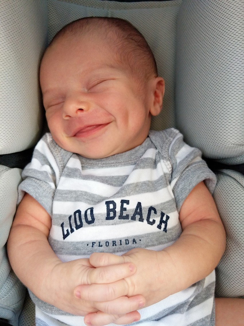 Dina and Austin Scherer didn’t want baby Charlie born in New York City. Too cold, too much snow, and they didn’t like the hospitals there. So, they moved to Lido Key for a while and made delivery plans at Sarasota Memorial.
