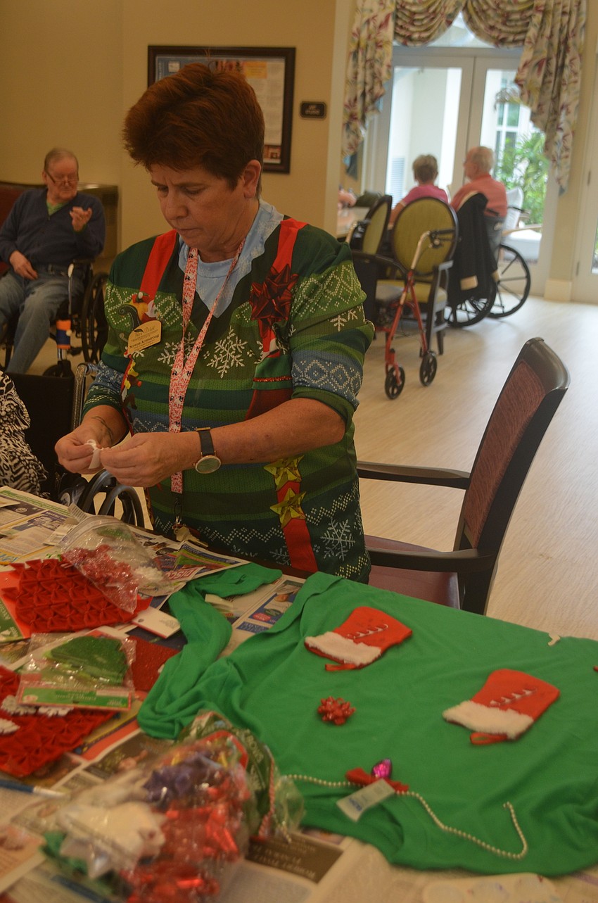 Serena Armstrong taught the the residents who participated how to make the sweaters.