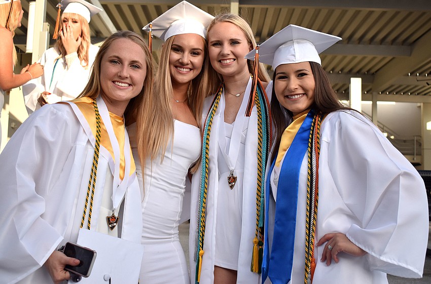 About 2,700 seniors from nine schools around Sarasota County walked the stage and graduated in cap and gown ceremonies.