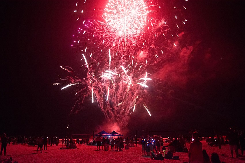 Thousands gathered for the big Fourth of July show at Siesta Beach and weren't disappointed. A downpour hours before cleared in time for fireworks and plenty of good times.