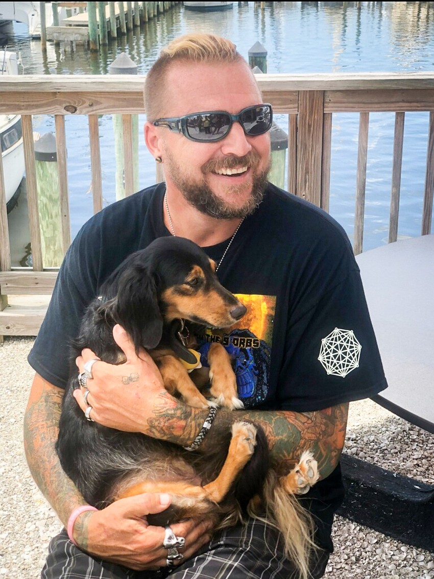 Shane Hale thought he had lost Harley forever when the 5-year-old dachshund floated off during a boating emergency in the Gulf.